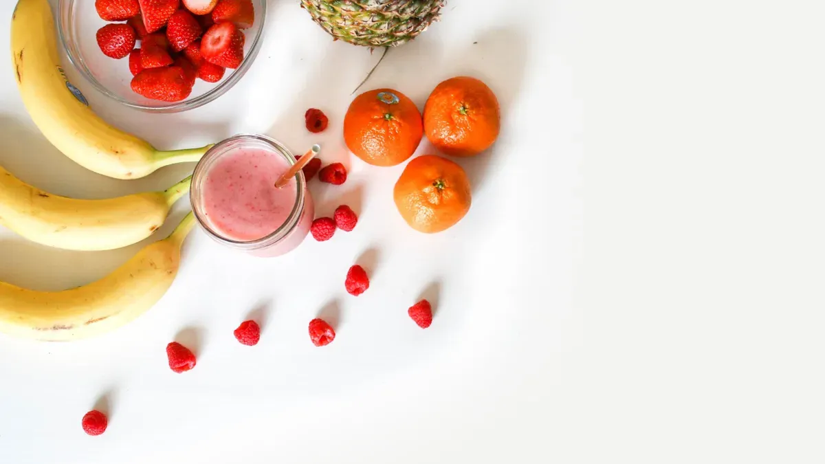 A field of wheat under a cloudy sky, symbolizing the impact of climate change on crop nutrition