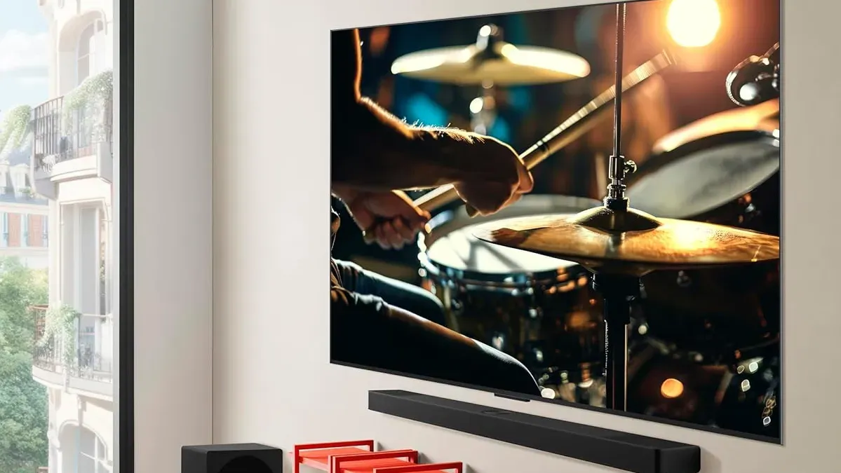 65-inch LG C5 OLED TV on a stand with Dolby Vision and 144Hz gaming features highlighted