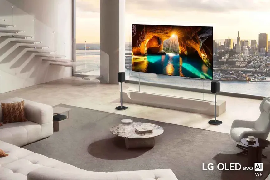LG OLED evo W6 TV displayed at CES 2025 with its ultra-thin 9mm profile and Zero Connect Box positioned nearby