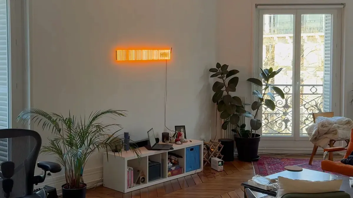 Spectrum Slit visualizing radio waves as a glowing U-shaped light display