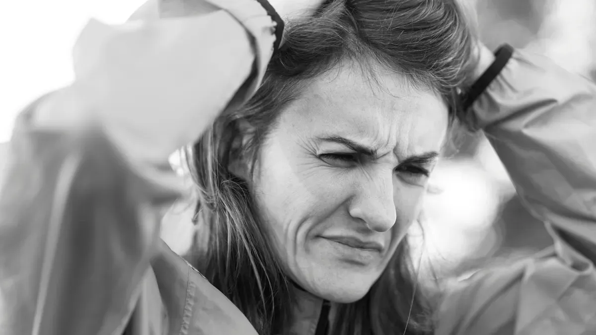 A parent and child at a playground, illustrating the link between hunger and irritability