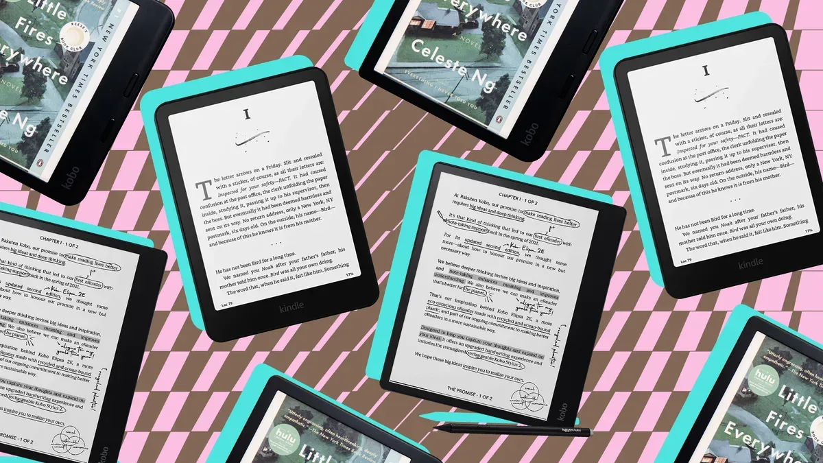 Side-by-side comparison of Kindle Paperwhite, Kobo Libra Colour, and Kobo Elipsa 2E e-readers on a wooden table with books and a stylus