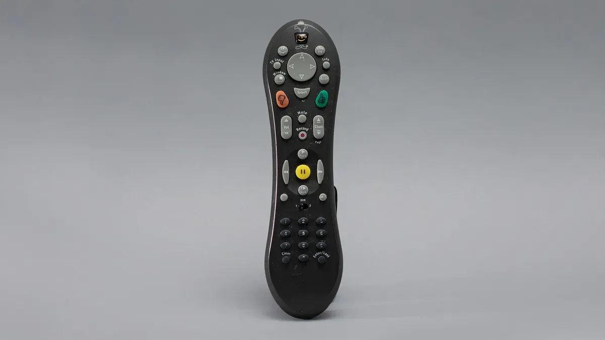 TiVo remote with pause button highlighted