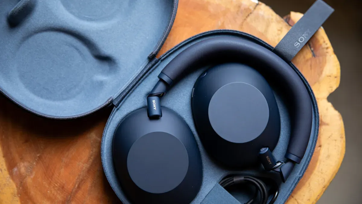 Bluetooth headphones with security warning symbol