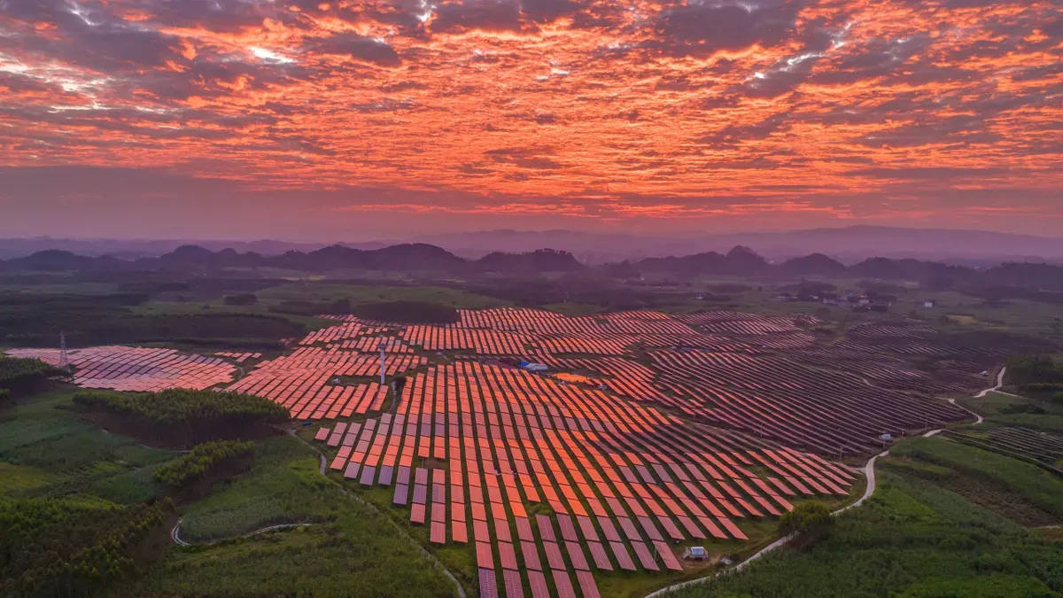 Graph showing China's carbon emissions plateau over 21 months with renewable energy growth metrics