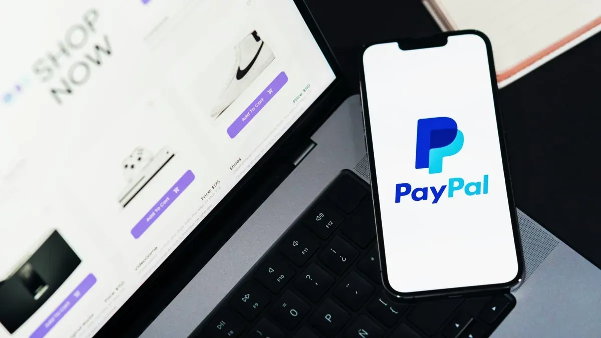PayPal logo with a red error banner across it, symbolizing data breach